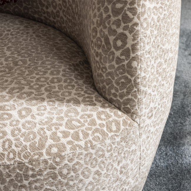 Mo - Fauteuil rond en tissu imprimé léopard